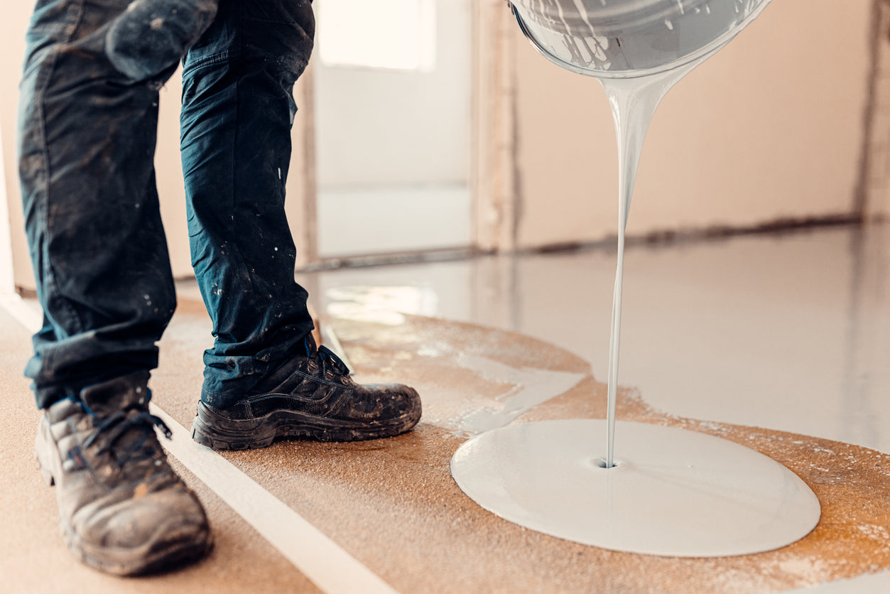 Applying coo-var epoxy floor paint